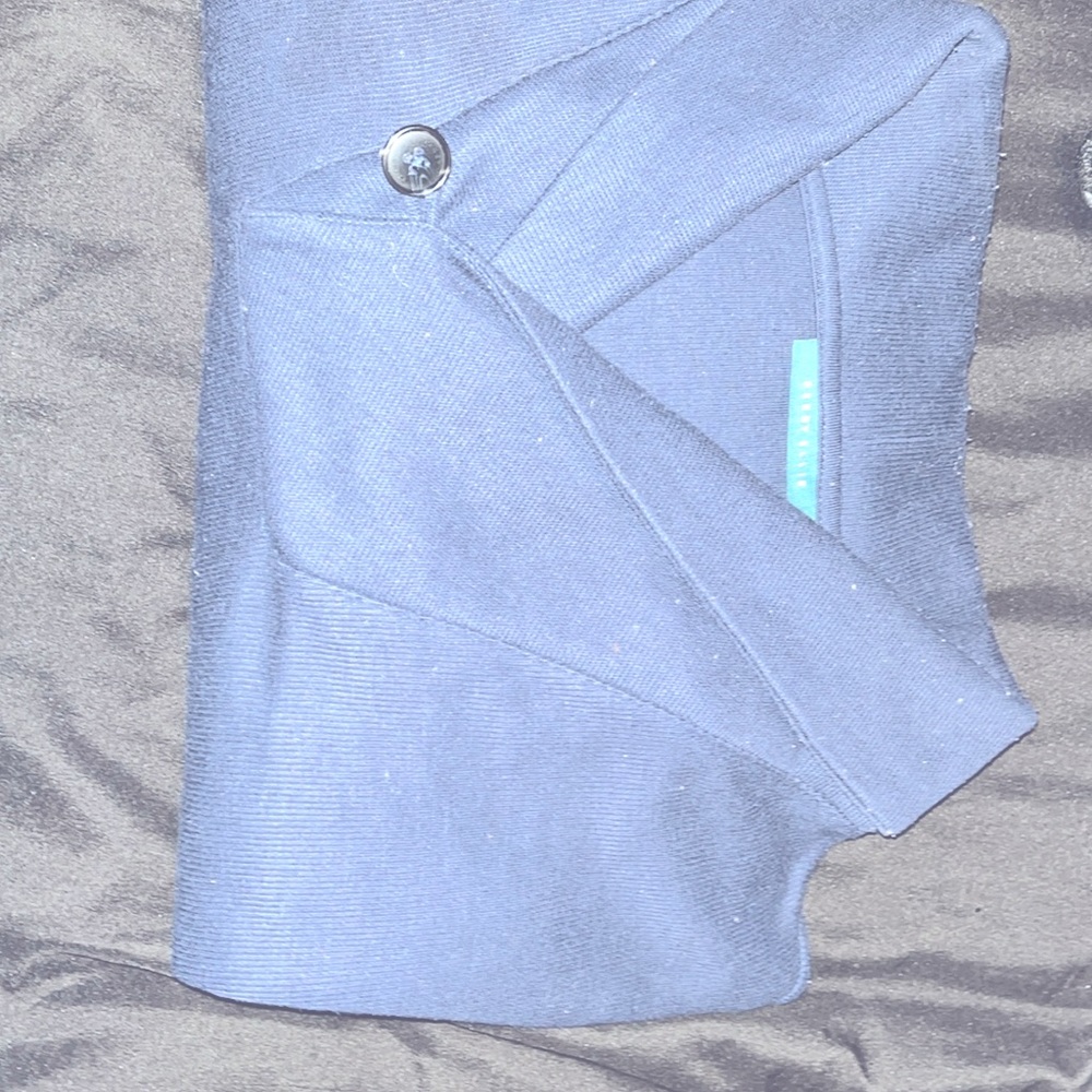 Gently worn sweater.